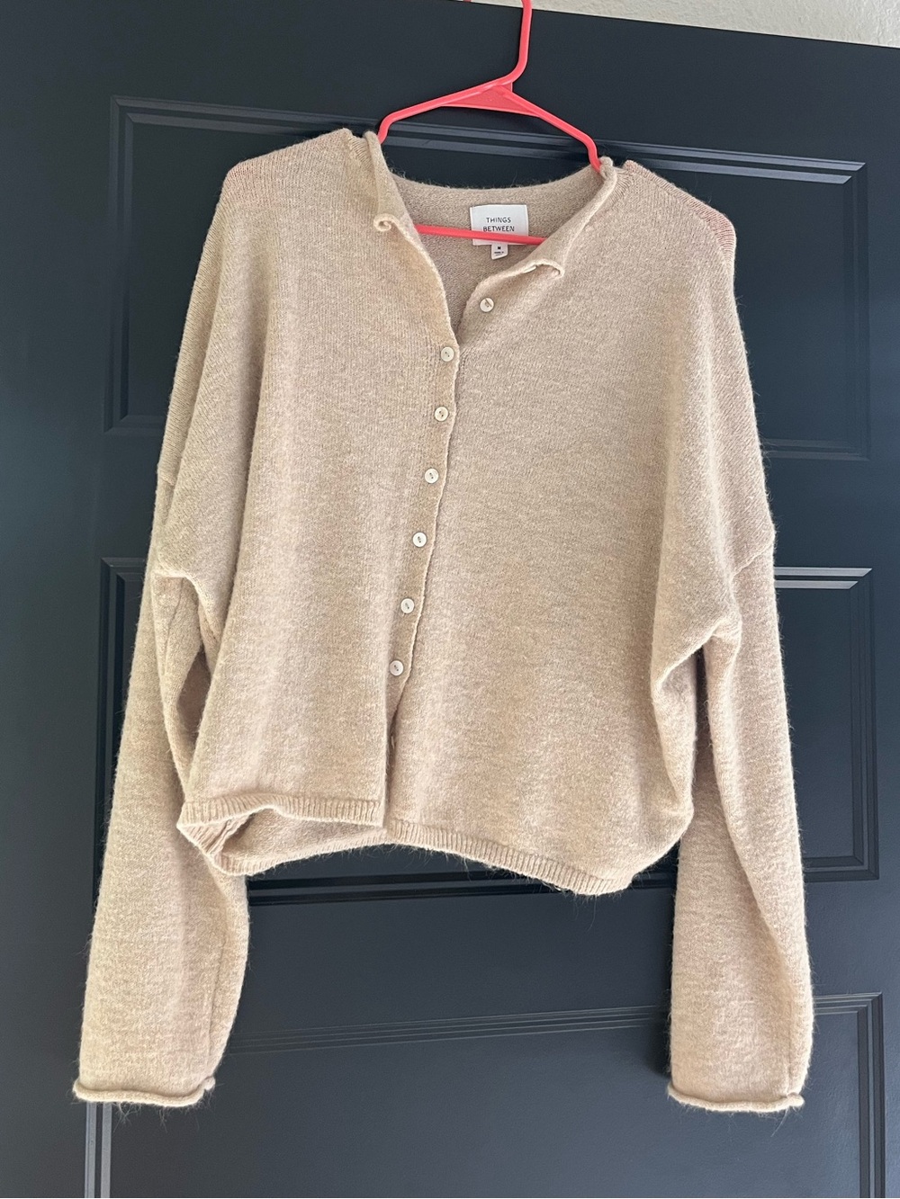 Things between beige/tan cardigan sweater